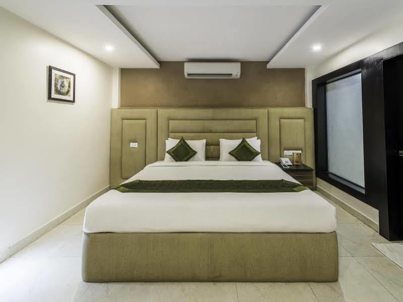 فندق Treebo Elan شيناي المظهر الخارجي الصورة